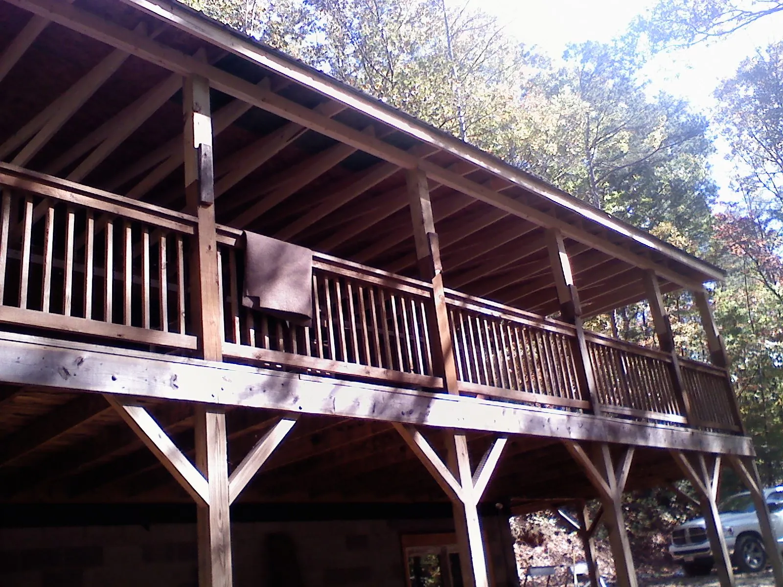 Timber framing under a new elevated porch and deck — Roof Leak Repair in Olanta by Roofing Brothers